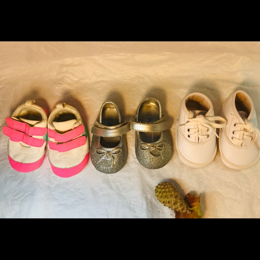 3 pairs of baby shoes. Size O-6 meses. Carter’s.